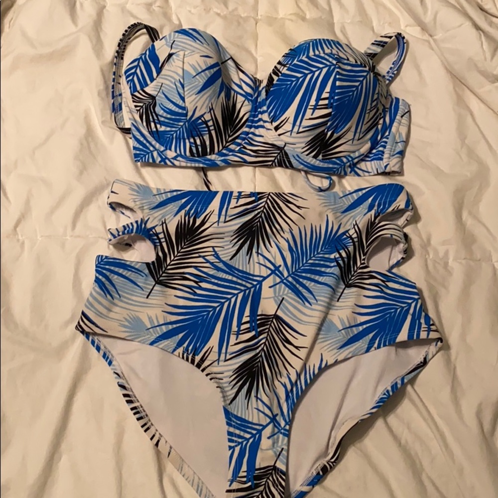Blue and white tropical bathing suit